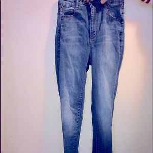 Dark blue high-waisted skinny jeans.